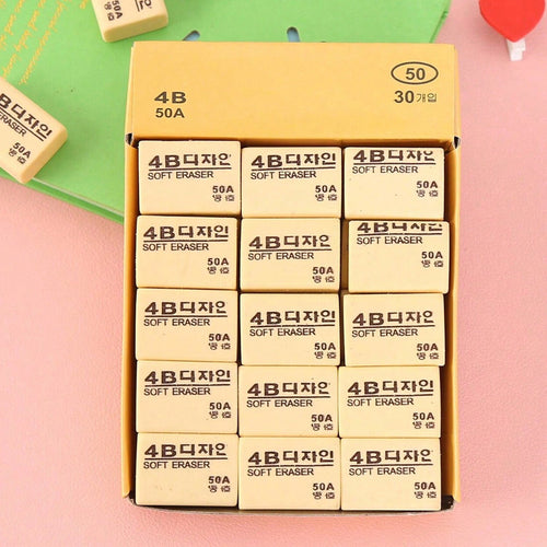 Thirty bright yellow 4B erasers neatly packaged for students and office use.