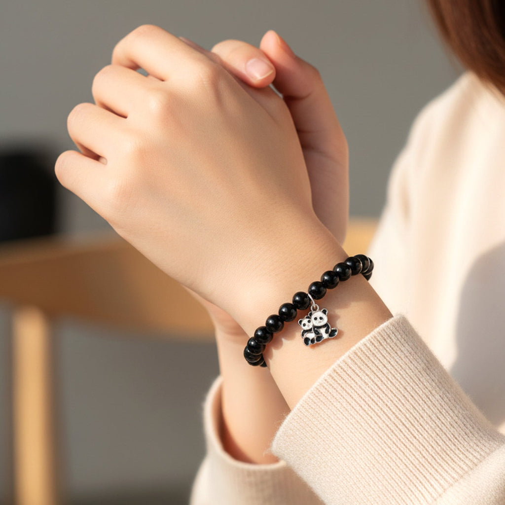 Elastic pastel bead bracelet for girls and women with decorative butterfly charm