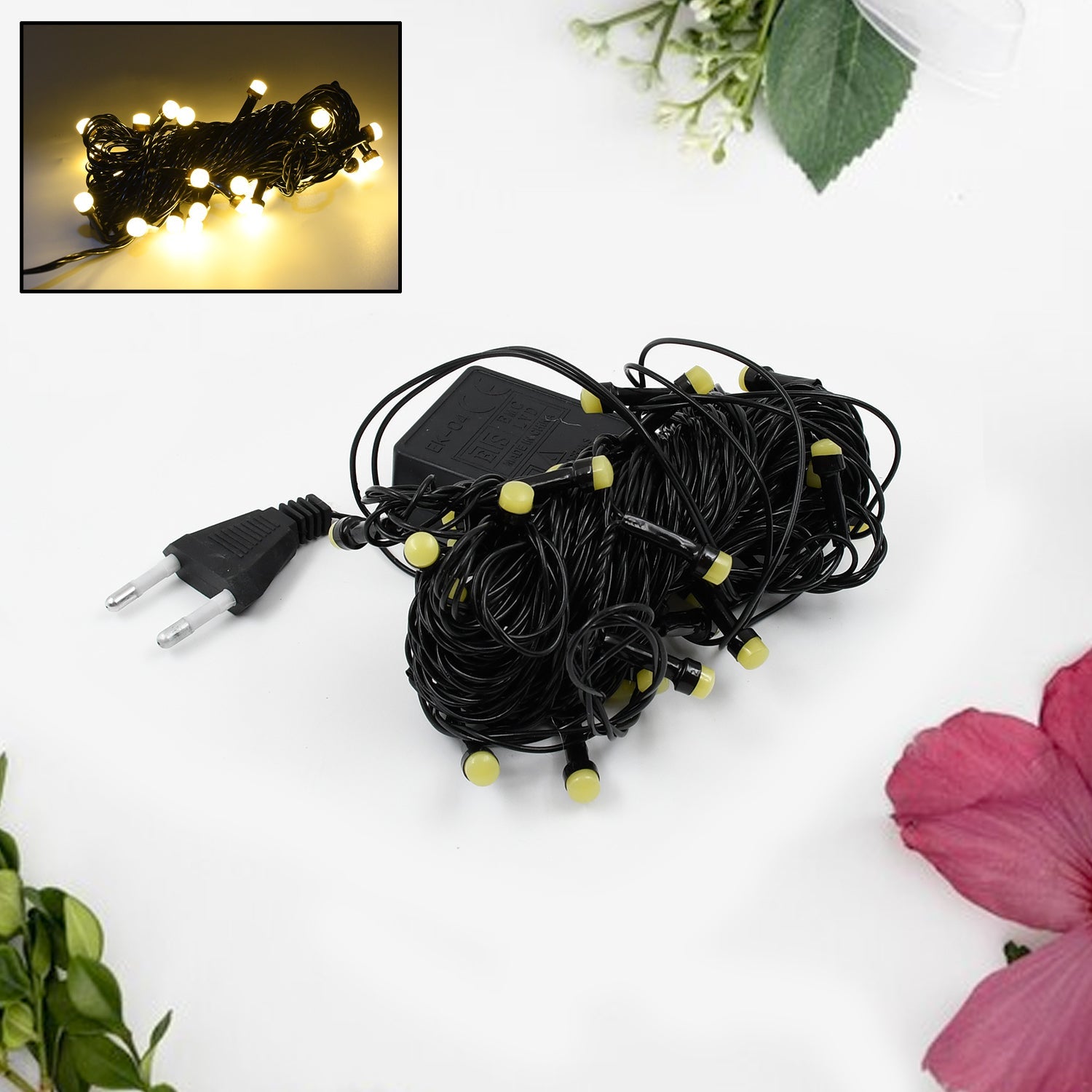 Decorative flower LED string lights brightening a living space.
