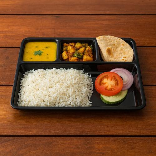 Durable plastic 4-compartment meal tray for portion control and organized dining.