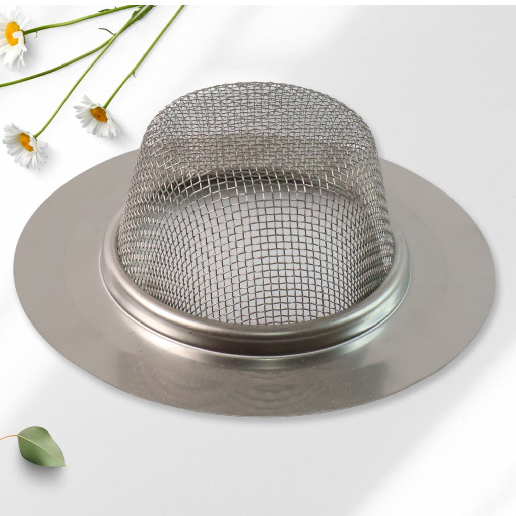 Fine mesh dome hair catcher trapping hair and debris