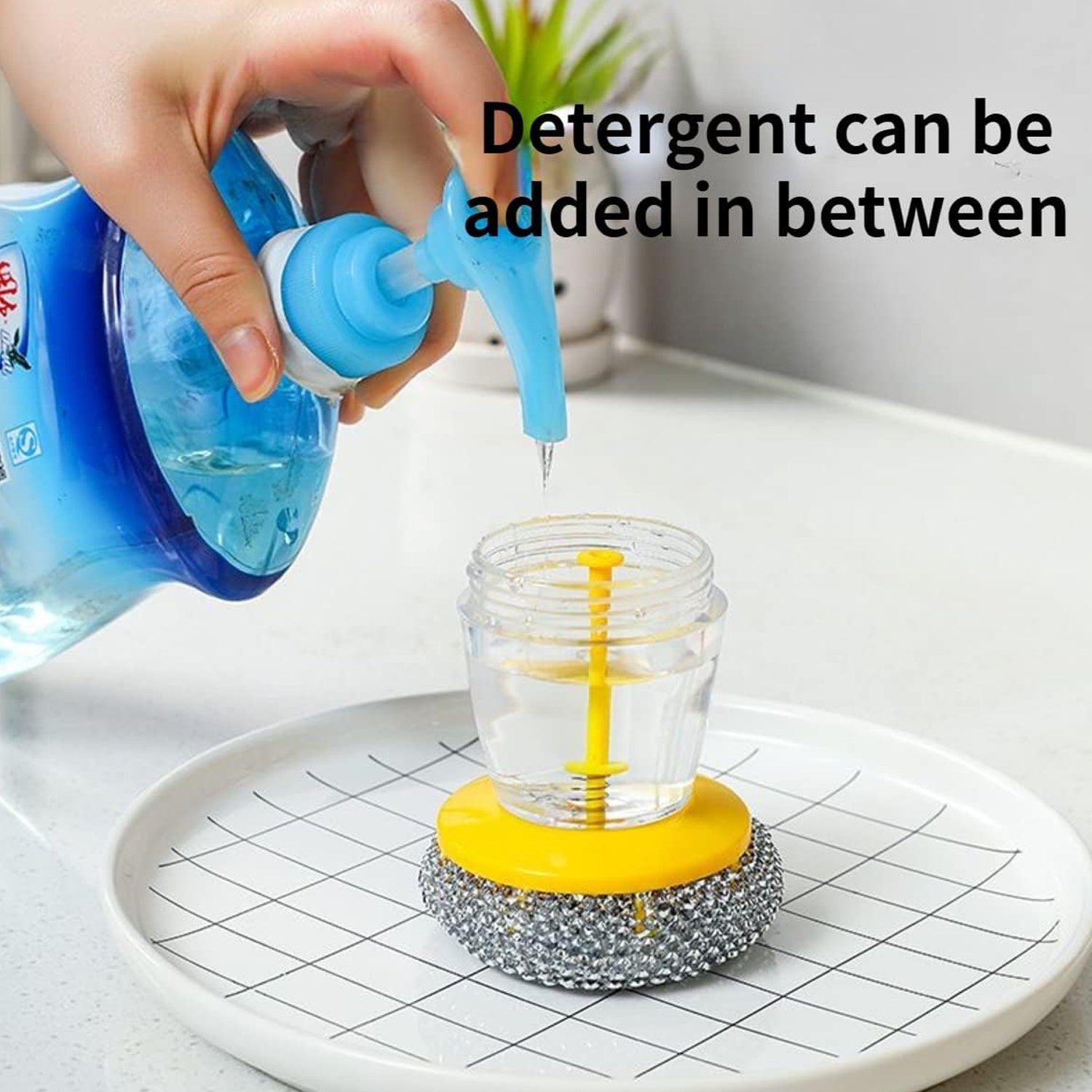 The soap dispenser with scrub in action, showing controlled soap release for efficient washing.