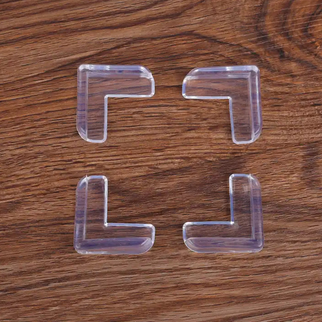 Flexible clear silicone corner guard on a furniture edge, showcasing its protective design.