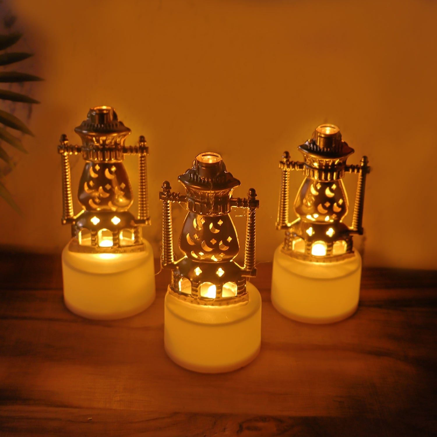 Vintage lantern style plastic candle lamps with warm flickering light