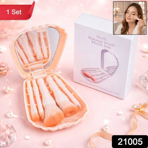 Makeup brush set displaying five soft brushes inside a mirror box
