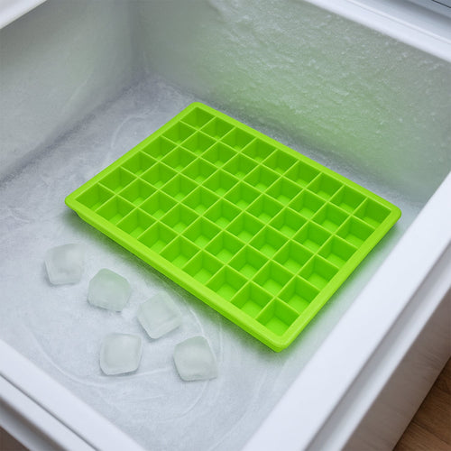 A white 60-Cavity Ice Tray ready to be filled, showcasing its compact design.