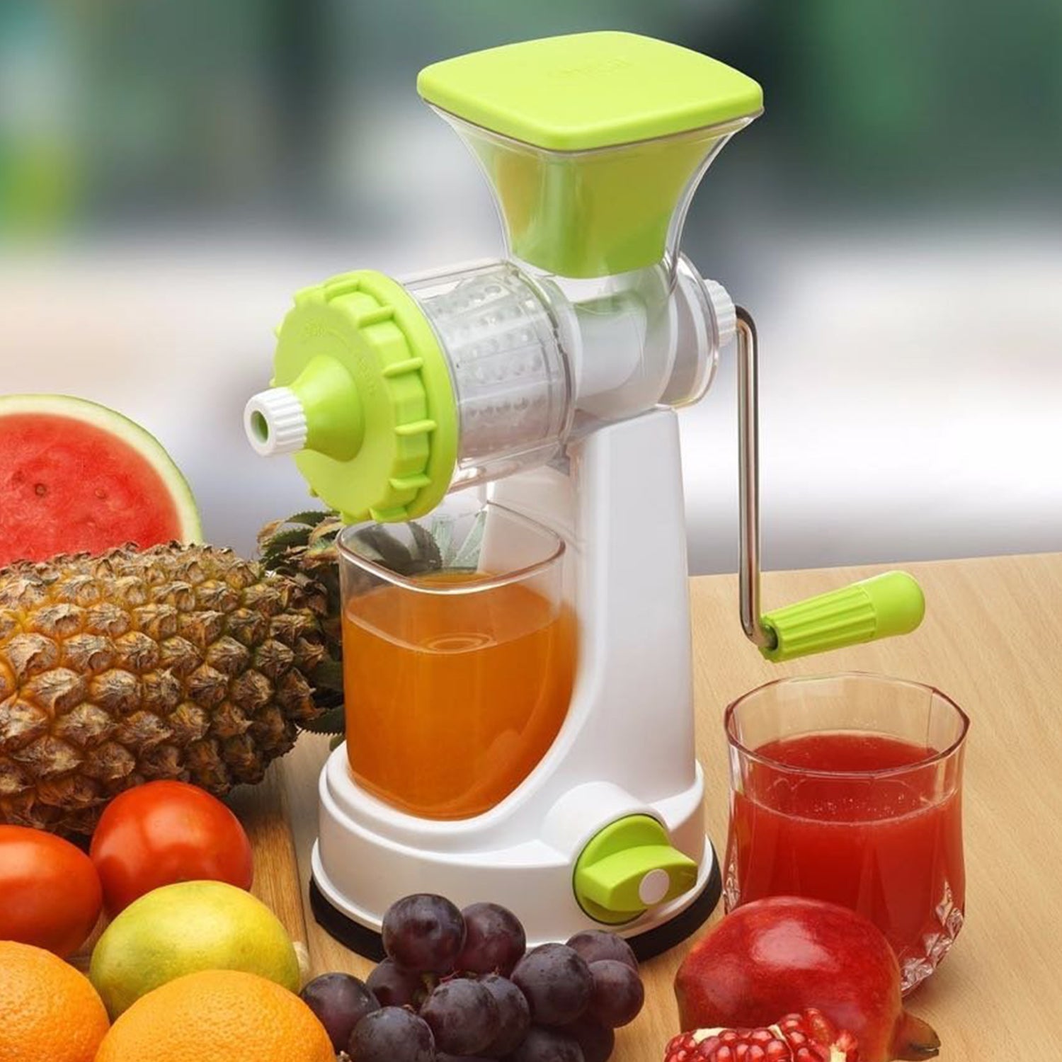 Multipurpose Ganesh vegetable and fruit juicer, featuring a sturdy vacuum base for stability.