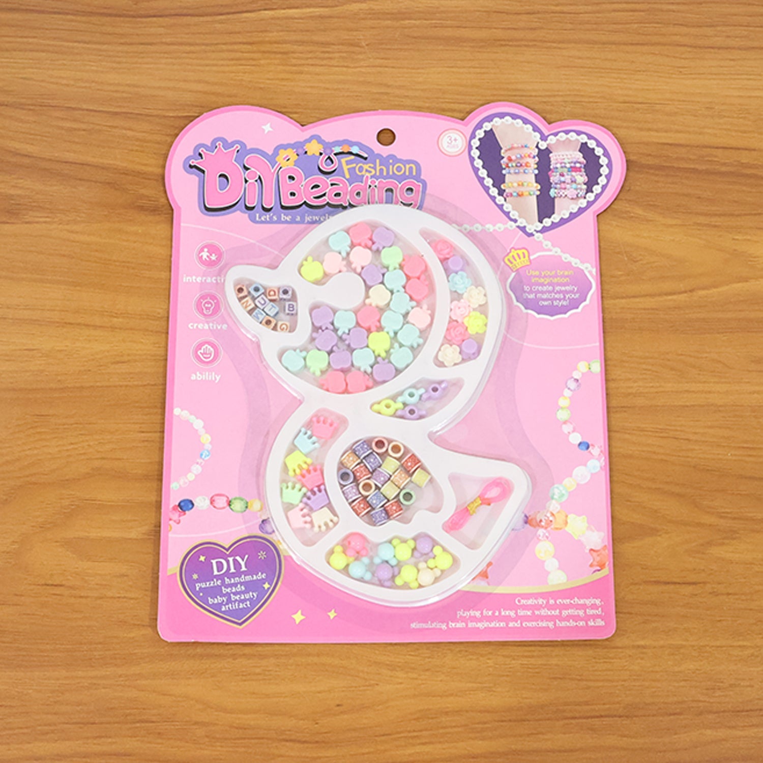 DIY kids jewelry craft kit with alphabet, flower, and crown beads