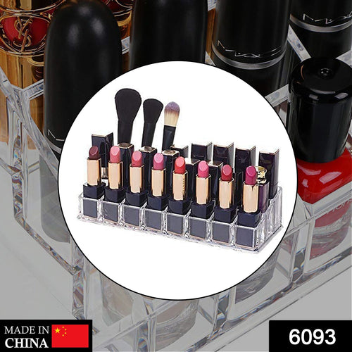 Close-up view of the 24-section acrylic cosmetic organizer, highlighting individual compartments for lipsticks.