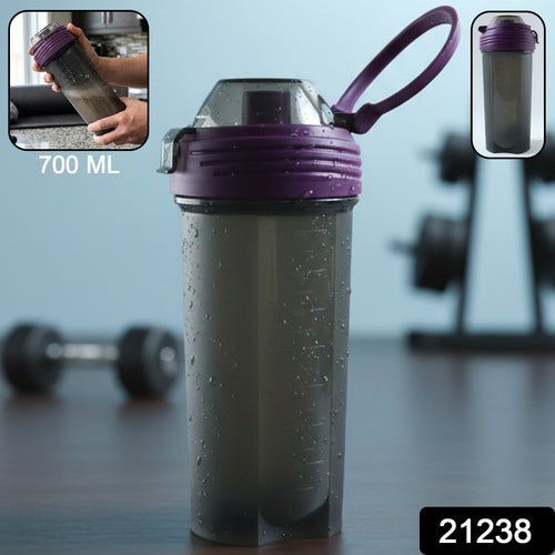 Clear plastic protein shaker bottle with secure flip lid